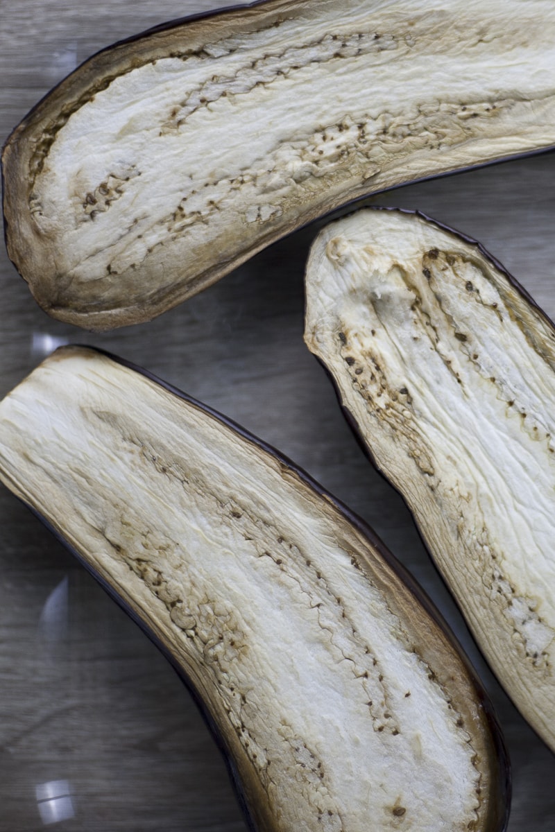 Close-up of eggplant halves after roasting