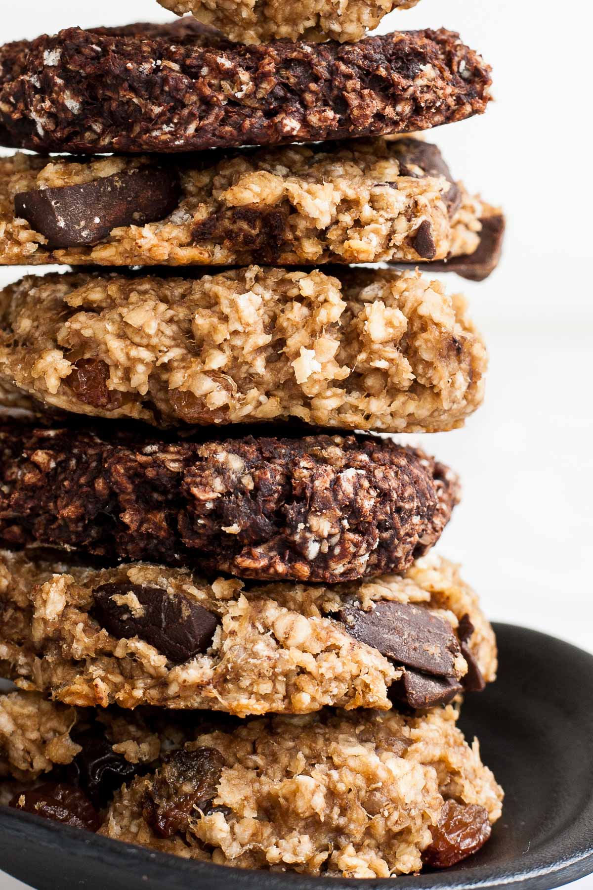 Stack of brown and dark brown oatmeal chocolate cookies.