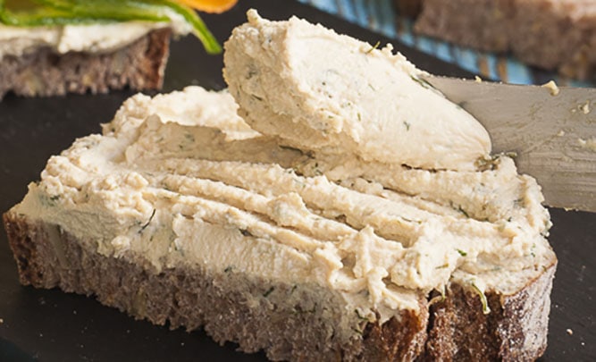 Close-up of a slice of bread topped with tofu cream cheese