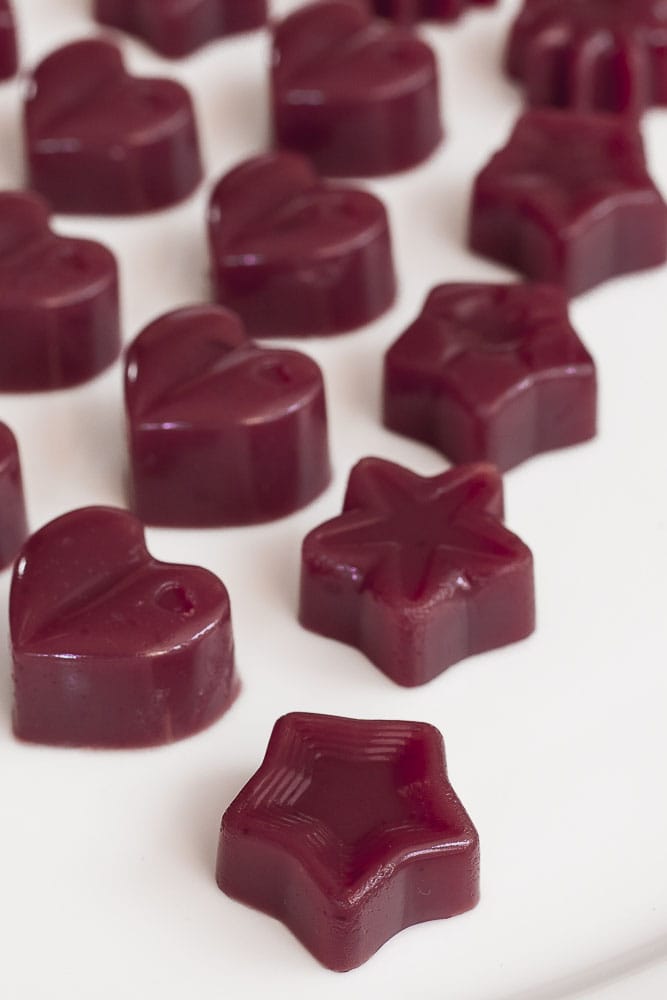 Several types of cranberry jelly shaped as hearts or stars