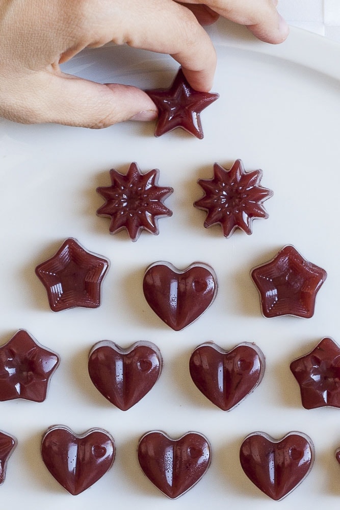 Several types of cranberry jelly shaped as hearts or stars