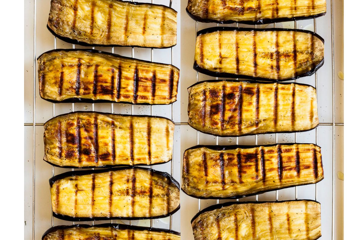 Roasted eggplant slices on a grill rack