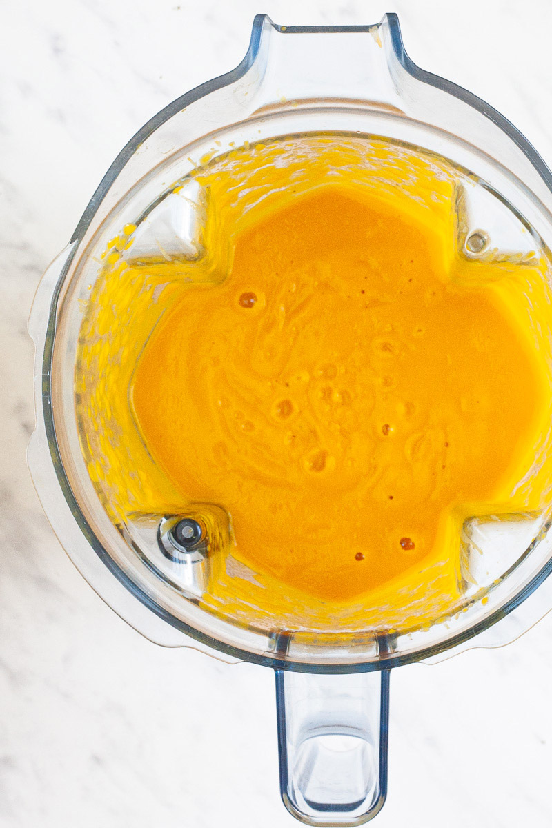 Blender from above with a thick orange soup