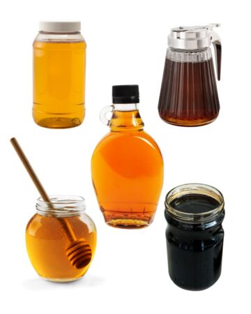 5 glass jars of different honey substitutes all of which are light to dark orange syrups