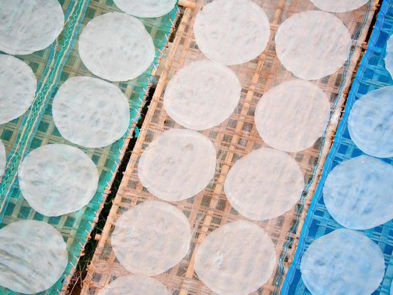 Round thing sheets are drying on colorful nets