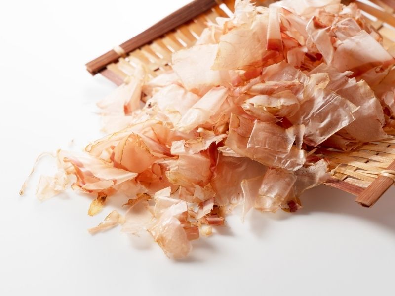 pink flakes on a bamboo mat