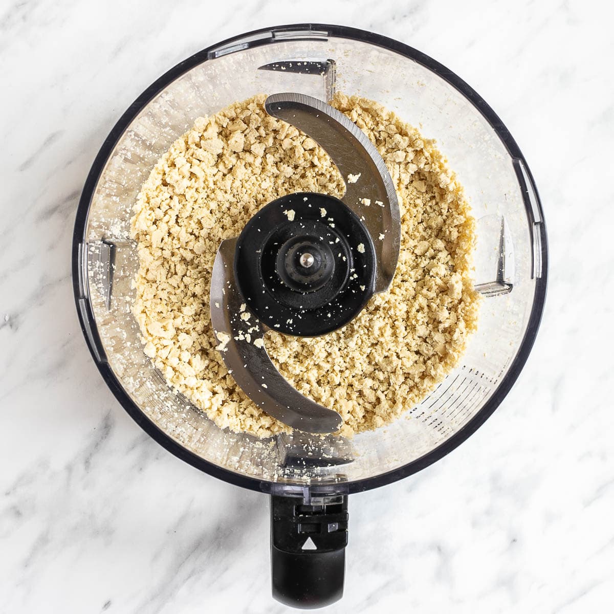 A food processor with tofu mince.