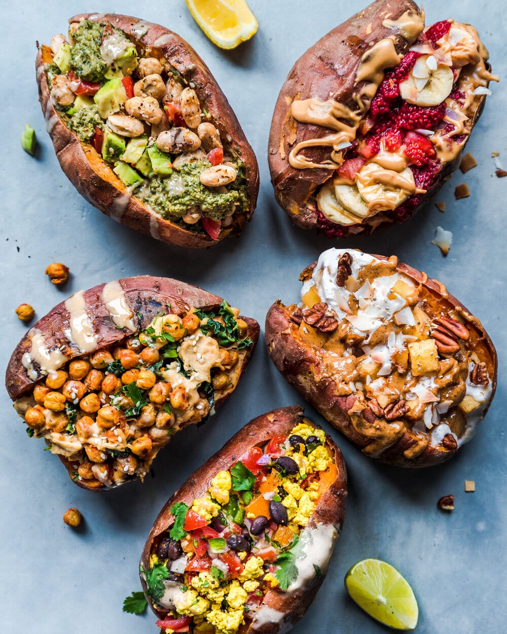 5 stuffed sweet potatoes with peel with 5 different toppings.