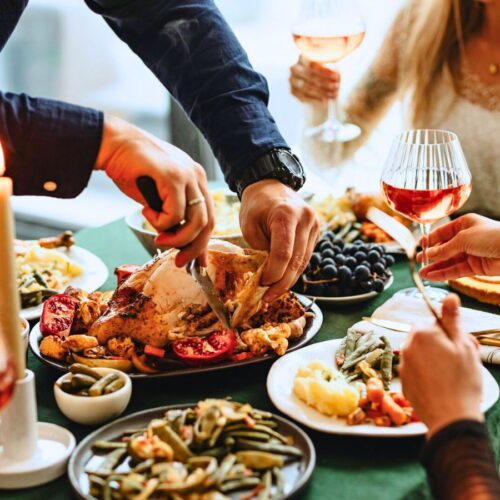 Cutting turkey during Thanksgiving.